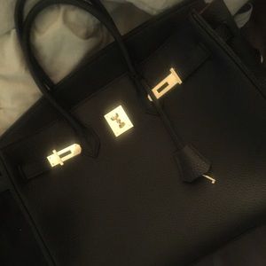Cherish Kiss celebrity key and lock bag